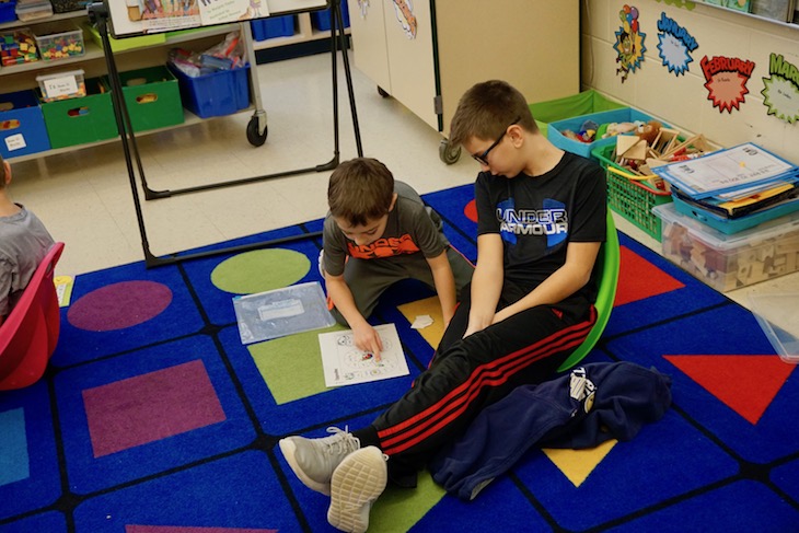 <p>Tutoring younger students.</p>
