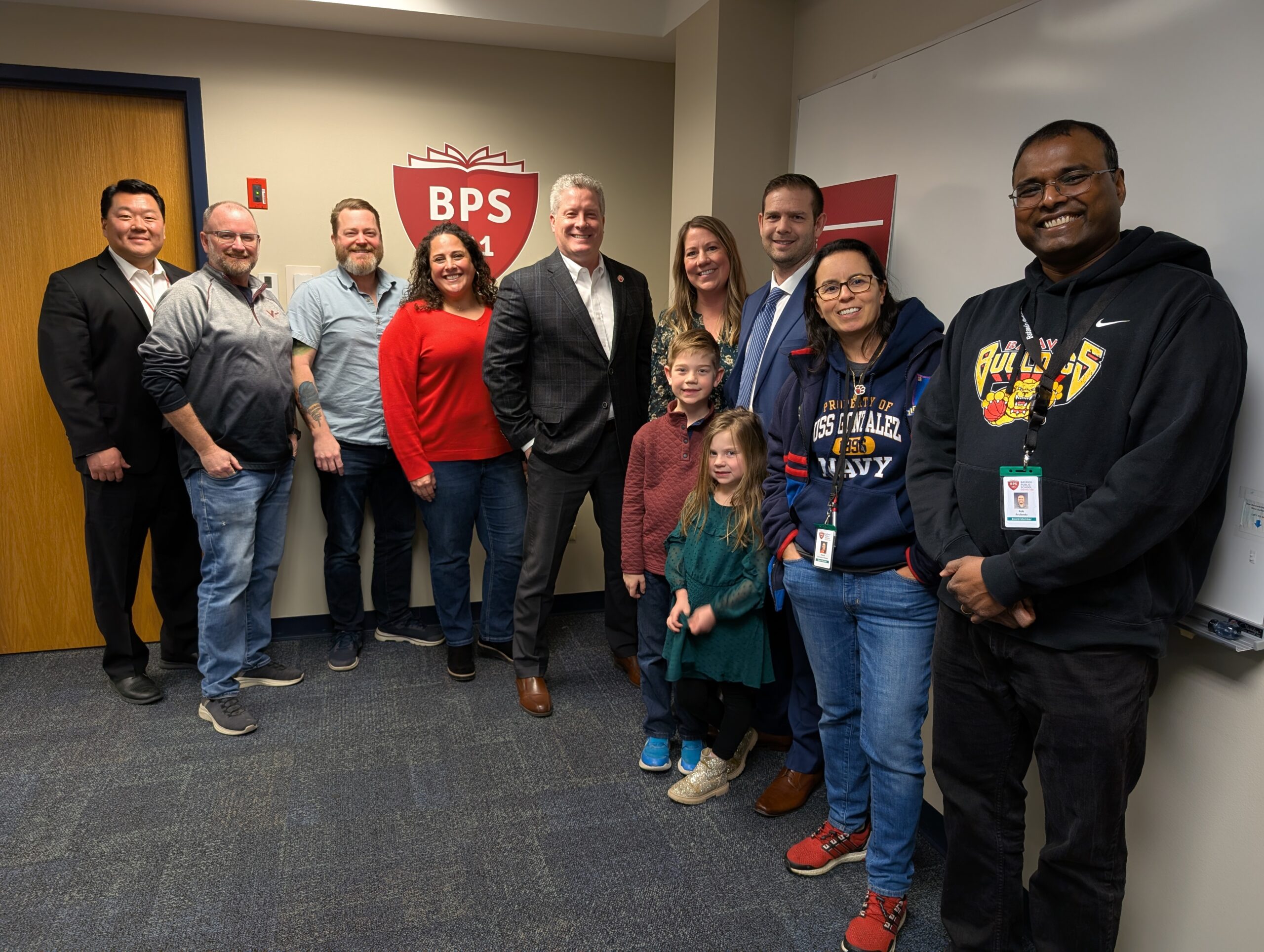 <p>Degman family with Superintendent Kim and BPS101 Board of Education</p>
